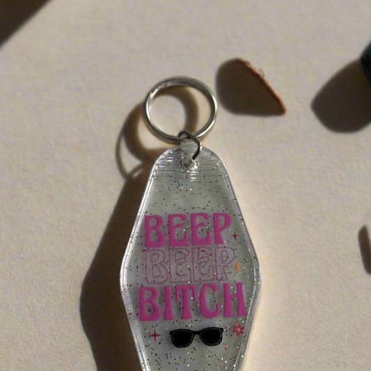 Clear glitter retro style motel key chain that says Beep Beep Bit**