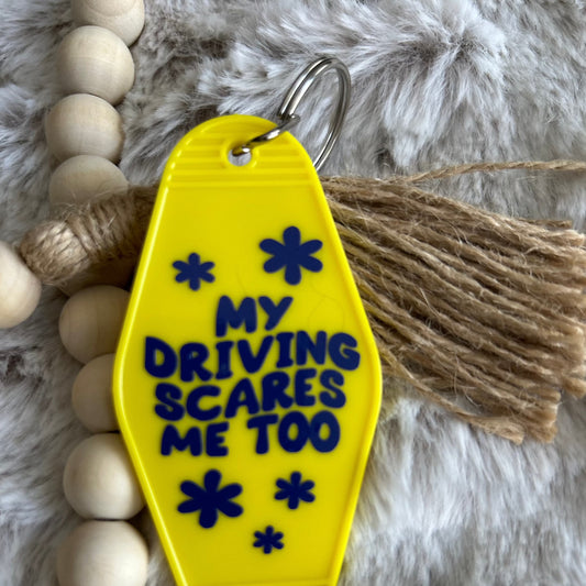 Yellow retro vintage style keychain that says my driving scares me too