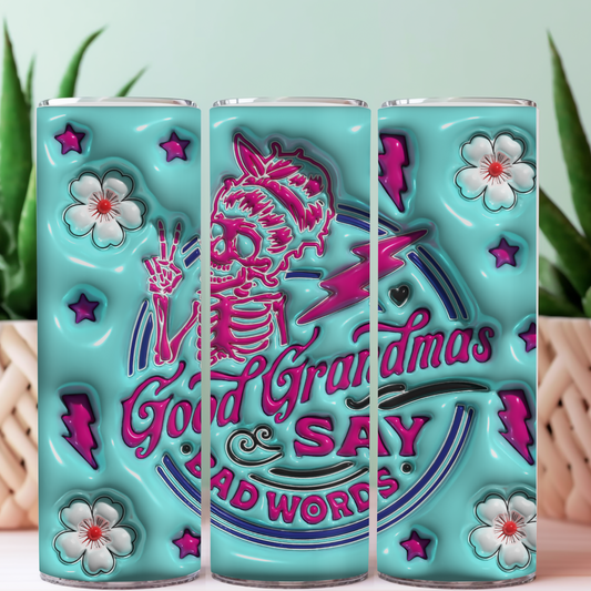 Good grandmas say bad words tumbler with a puff design in the colors teal, hot pink , white, and bluish  purple
