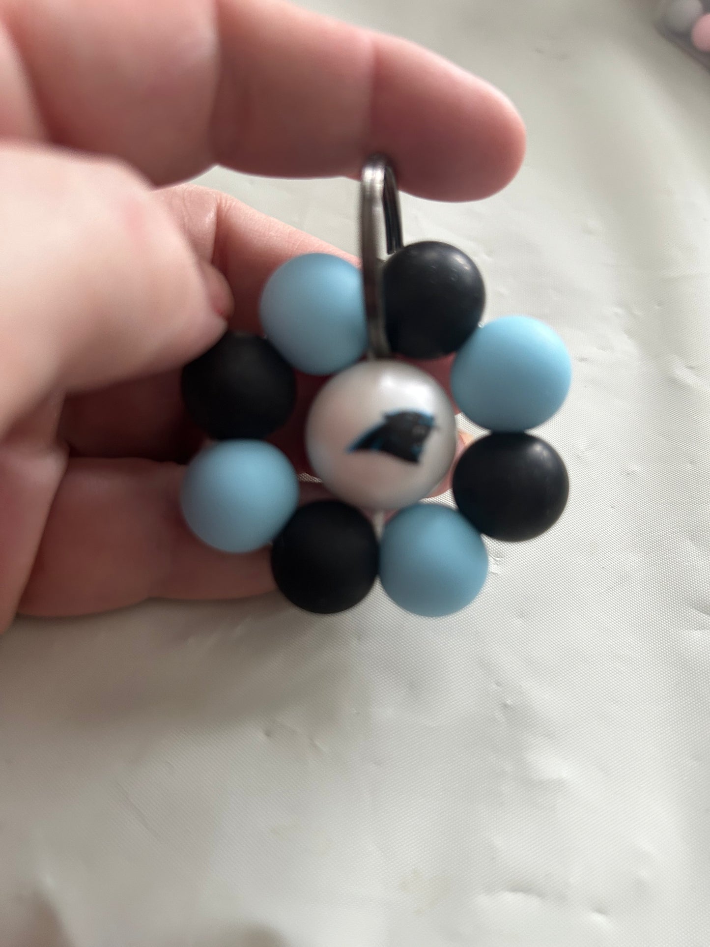 Blue and black sports flower keychain