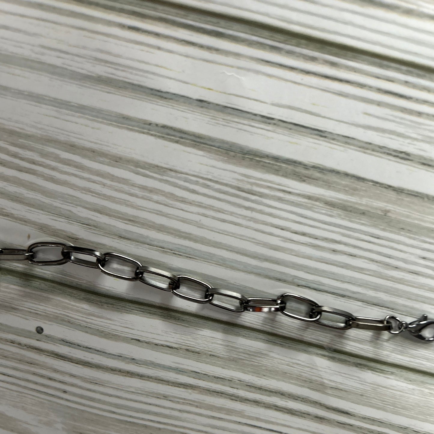 Gun metal trucker hat chain