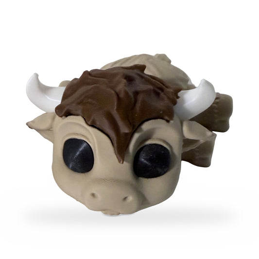 Flexi highland cow fidget toy with white horns