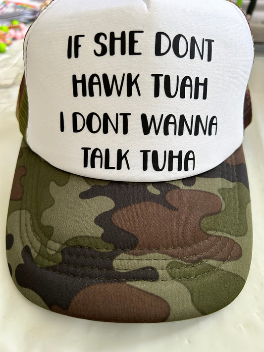 Hawk Tuah Trucker hat on a camo hat