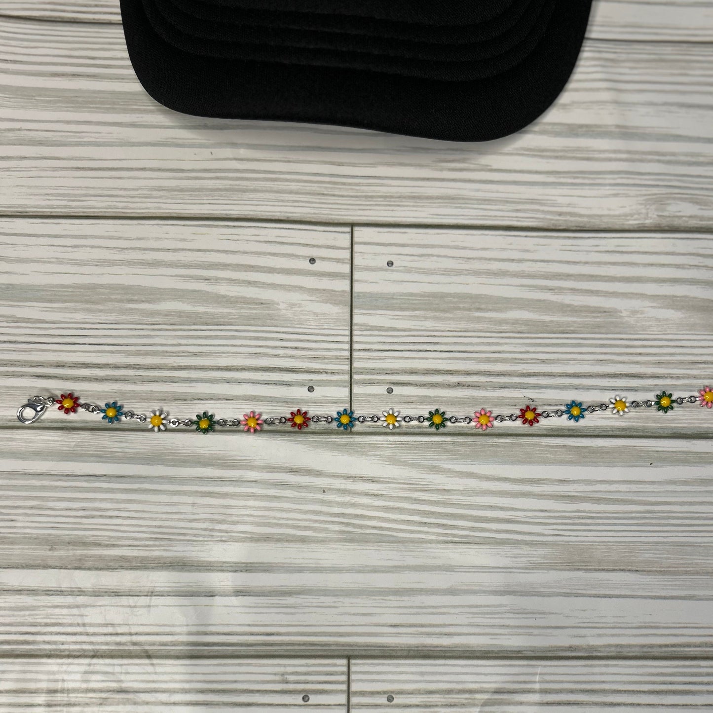 Daisy Delight: Multi-Colored Trucker Hat Chain