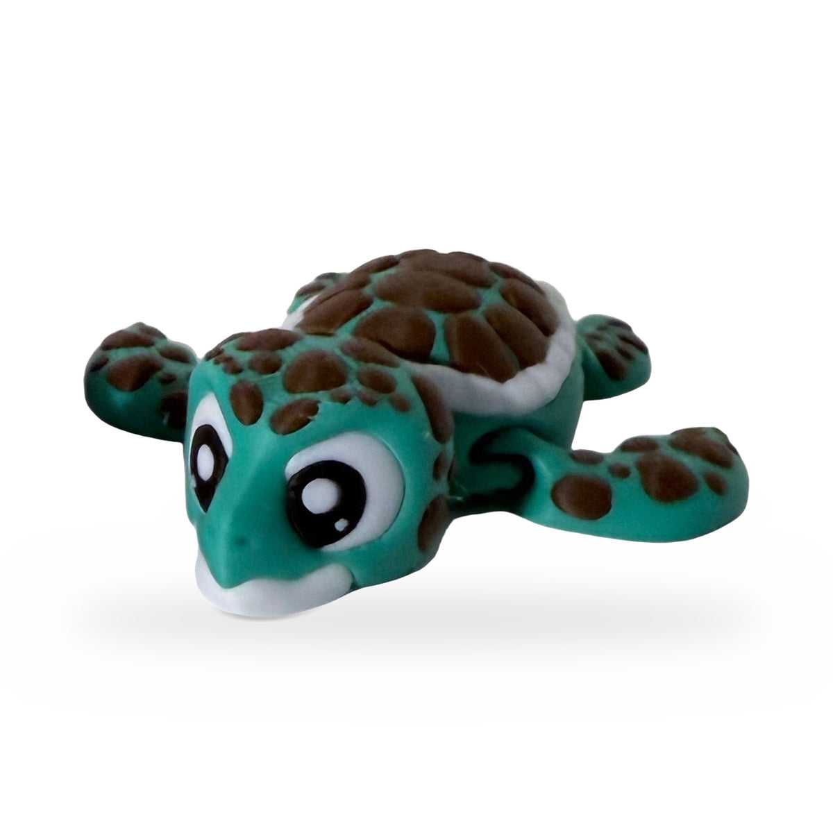 Teal flexi sea turtle with big cartoon eyes