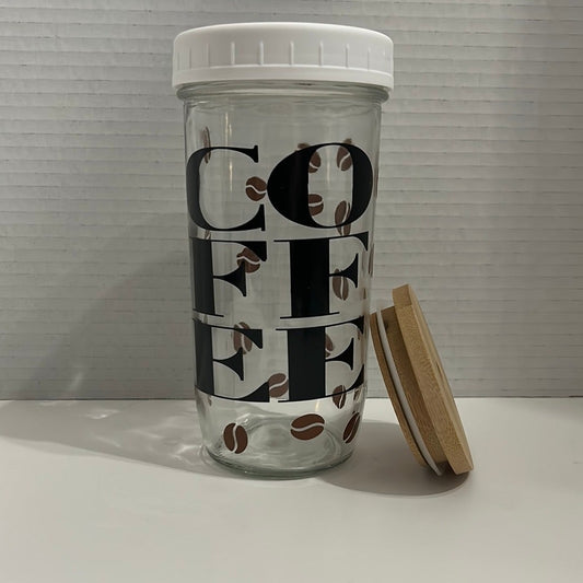 24 ounce glass tumbler with 2 lids